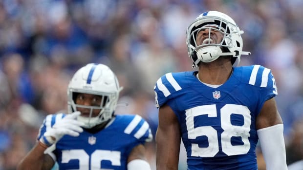 Indianapolis Colts safety Rodney McLeod Jr. (26) and Indianapolis Colts linebacker Bobby Okereke (58) celebrate a defensive stop Sunday, Oct. 16, 2022, during a game against the Jacksonville Jaguars at Lucas Oil Stadium in Indianapolis